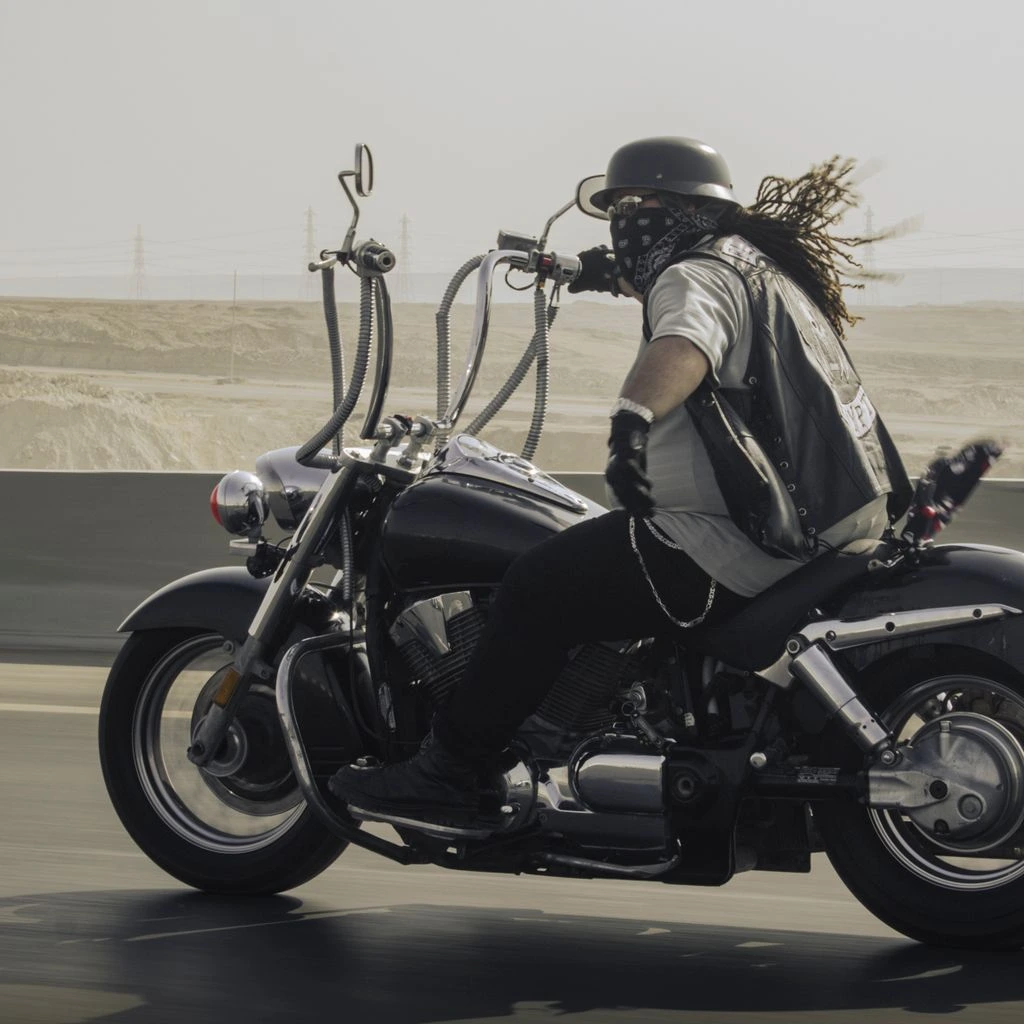 Cruiser riding straight toward Monument Valley buttes